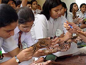 Students of KVM show their skills at a mehndi competition on Saturday