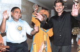 Singer Shankar Sahwney (right) and Mukesh Gupta of the Haryana Maitrai Sangh performing during the Teej festival, organised by the sangh, in the Capital