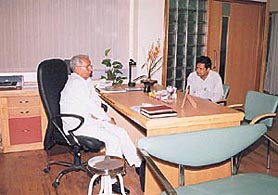 Dr P. K. Dave interacting with a patient at Rockland Hospital.