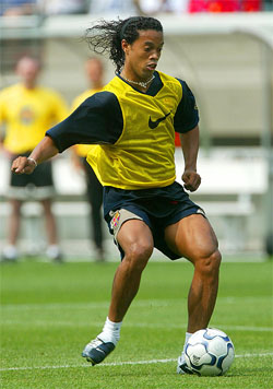Barcelona's Brazilian striker Ronaldinho passes the ball during a training session 