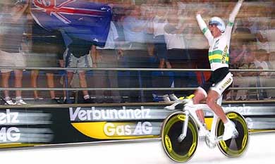 Australian cyclist team's Peter Dawson celebrates after winning the Men's Team Pursuit final race