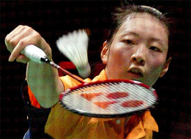 Gong Ruina of China returns to compatriot Zhang Ning in the women's singles final 