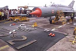People watch MiG 29 and other ammunitions