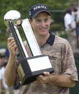 Jim Furyk holds his trophy after winning the 2003 Buick Open 