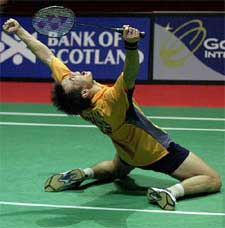 China�s Xia Xuanze celebrates after winning the men�s singles final at the World Badminton Championships 
