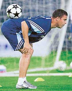 Real Madrid's Ronaldo displays his ball control skill at a team training session 