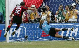 Juventus goalkeeper Gianluigi Buffon saves a penalty kick by AC Milan�s Christian Brocchi 