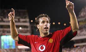 Manchester United's Ruud Van Nistelrooy celebrates after scoring against FC Barcelona