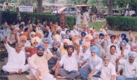 Members of the Indian Ex-Services League, Punjab and Chandigarh, protest against the sales tax on CSD items in Ludhiana