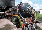 Railway workers give final touches to the 56-year-old Canadian engine