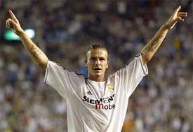 Real Madrid�s English mid-fielder David Beckham celebrates after scoring the first goal 