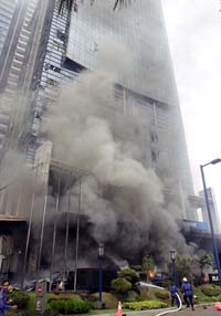 Black smoke rises from the Marriott Hotel in downtown Jakarta, Indonesia, on Tuesday.