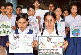Students of GMSSS Sector-46, display posters against war to mark Hiroshima-Nagasaki Day which was observed at the school in Chandigarh on Wednesday.
