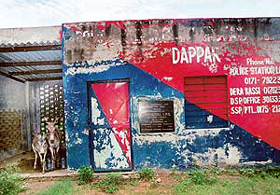 Donkeys enjoy a siesta at a first-aid post that was set up by the Punjab Police to provide immediate assistance and first-aid to victims of road accidents on the busy Ambala-Kalka highway in Dappar in June 1999. 