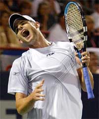 Andy Roddick from the USA reacts during his second round match against Juan Ignacio Chela from Argentina at the Tennis Masters Canada Series