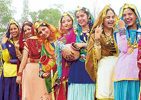 Participants at Miss Teej contest wait for their turn outside their college auditorium at the Government Polytechnic for Women in Ludhiana on Friday.
