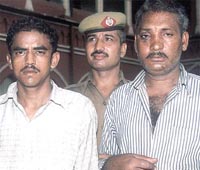 Surender Singh and Devender Kumar who were arrested at Old Delhi Railway Station in the Capital on Friday