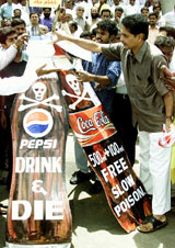BJP activists pour petrol on effigies of Coca-Cola and Pepsi bottles 