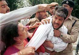 Jammu and Kashmir Democratic Freedom Party president Shabir Ahmad Shah being taken into preventive custody 