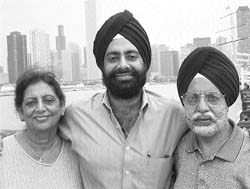 Chirinjiv Singh Kathuria flanked by parents.