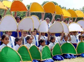 Students prepare for the Independence Day function at the Government College for Boys ground 