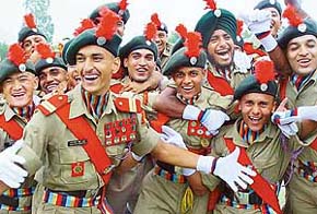 NCC cadets share lighter moments after the Independence Day parade at the Parade Ground