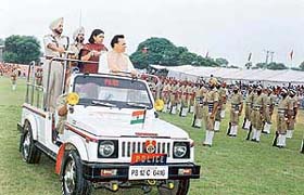 Punjab Medical Education and Research Minister Chaudhary Santokh Singh inspects a parade on the occasion of Independence Day 
