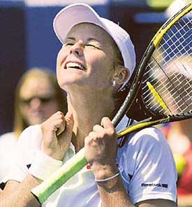 Lina Krasnoroutskaya of Russia celebrates her win over Kim Clijsters of Belgium 