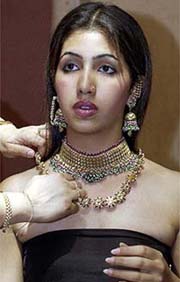 A model displays diamond and pearl jewellery by designer Anuradha Chhabra during the Zak jewels 2003 exhibition in New Delhi