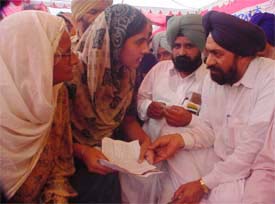 Manpreet Kaur of Ahmedgarh narrates her woes to Mr Balwant Singh Ramoowalia 