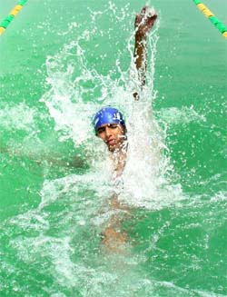 A participant at the trials to select the Punjab teams for the forthcoming National Aquatics Championship