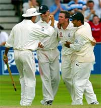 England's  Michael Vaughan, Marcus Trescothick, James Kirtley and Mark Butcher celebrate their victory against South Africa 