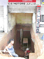 The basement in booth No. 171 being dug at the Mani Majra Motor Market on Tuesday.