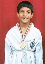Jatin Sachdeva who won a gold medal in the �Group Tulls Boys� category of Taekwon-Do competition