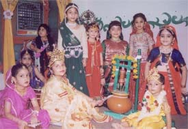 A little Krishna set to eat butter during Janmashtmi celebrations at a function organised by Nritya Bharati