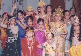 Children dressed up as Lord Krishna and Radha participate in Janmashtmi celebrations