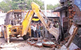 The demolition drive at Kamla Market Near Asaf Ali Road by MCD