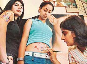 A trained artiste from Delhi spills the magic of crystal and colour on a belle of the City Beautiful at Ethos in Sector 8