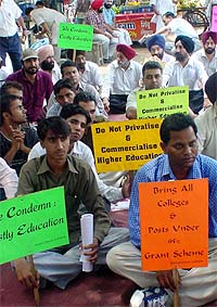 Members of the Punjab and Chandigarh College Teachers Union protest outside the Deputy Commissioner�s office in Ludhiana