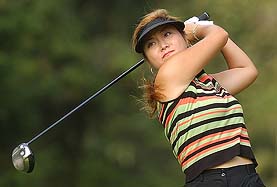 Sunny Lee from South Korea watches her drive on the eighth tee