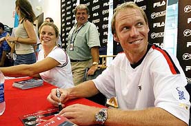 Tennis professionals Rainer Schuetter and Kim Clijsters