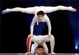 Actors of China's Guangdong Circus perform during a show