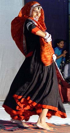 A college student participates in a talent show contest