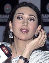 Bollywood actress Karisma Kapoor interacts with mediapersons