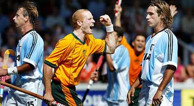 Robert Hammond of Australia celebrates his team's seventh goal against Argentina