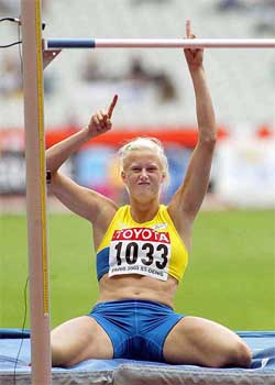 Sweden's Carolina Kluft reacts after completing her high jump