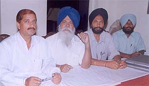 The president of the Punjab Roadways Transporters Association, Mr Bhag Singh Bhaura, addresses mediapersons in Ludhiana