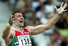 Belarus's Andrei Mikhnevich celebrates his win in the Men's shot put final at the 9th World Athletic championships