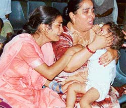 Wailing wife and mother of Jagdish, who was stabbed to death at Ram Darbar in Chandigarh