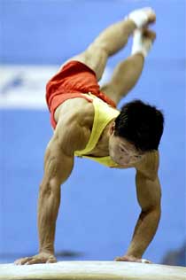 Li Xiao-peng of China performs on the vault 